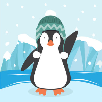 Cute penguin in a hat  on ice floe