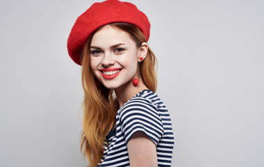 portrait of young woman in red hat