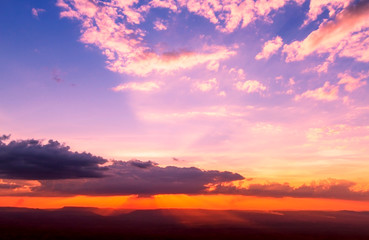 Fototapeta na wymiar Beautiful of fiery orange sunset sky background