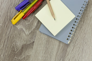 Set of office supplies for work with wood texture background