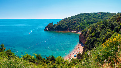 View from above to Adriatic sea coastline and Mogren beach in Montenegro, nature landscape and seascape, vacations to the summer paradise
