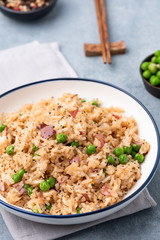 Japan rice fired with peas and chopstick 