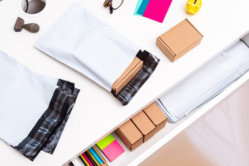 Office desk with post envelopes, top view