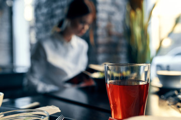 man drinking coffee in cafe