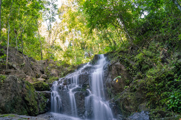 Ton Sai Waterfall in the tropical forest area In Asia, suitable for walks, nature walks and hiking, adventure photography Of the national park Phuket Thailand.