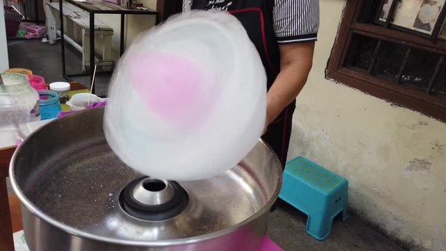 24th April 2019, Ipoh, Malaysia: Hand rolling cotton candy in candy floss machine