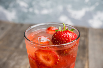 Strawberry cocktail on the rustic background. Selective focus. Shallow depth of field.