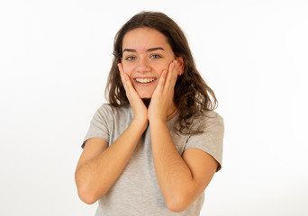 Human expressions and emotions. Portrait of young attractive girl smiling with surprised happy face