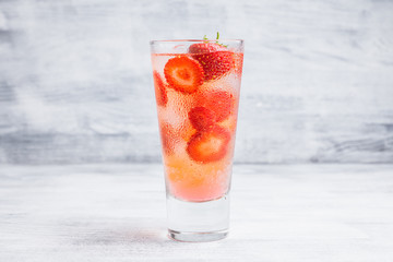 Strawberry cocktail on the rustic background. Selective focus. Shallow depth of field.
