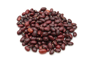 Spilled pile of raw red beans on white background