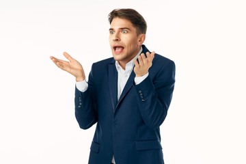 young man talking on the phone isolated on white