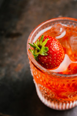 Old fashioned strawberry cocktail. Selective focus. Shallow depth of field.