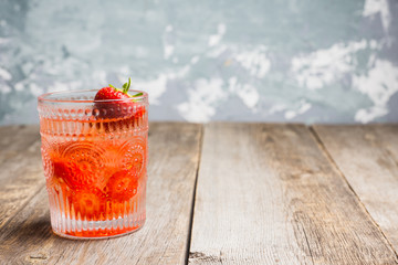 Old fashioned strawberry cocktail. Selective focus. Shallow depth of field.