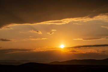 Red sunset with cloudy sky