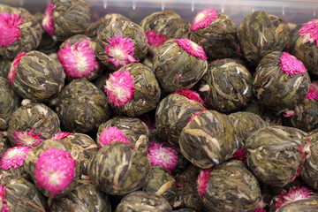 Fototapeta na wymiar Flowering traditional chinese bound green tea.