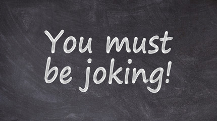 You must be joking written on blackboard