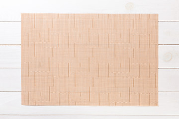 Tablecloth textile on wooden background top view with copy space