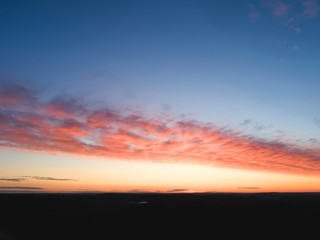 Sunset with beautiful red sky and clouds