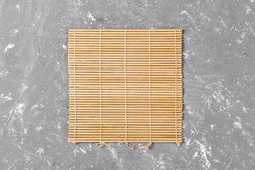 Empty Asian Food Background. brown Bamboo mat on wooden background top view with copy space flat lay