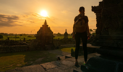 Tourist meets Sunrise at Plaosan temple in Java island,Indonesia