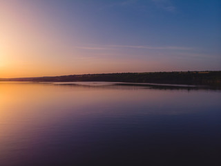 Sunset on the edge of a lake in the country, Moldova, 2019