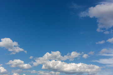 Naklejka na ściany i meble Sky with cloudscumulus clouds on clear blue sky before rain
