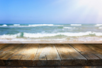 background of wood deck in front of sea landscape. ready for product display