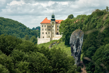 Castle on the hill in Ojcow National Park Poland - Pieskowa Skala, Hercules's mace rock  - obrazy, fototapety, plakaty