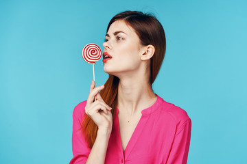 woman with lollipop isolated on white background