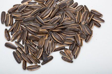 pile of sunflower seeds isolated on white