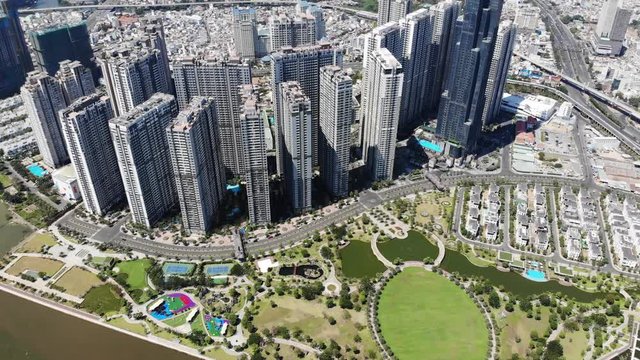 Skylines with downtown behind aerial shot in Ho Chi Minh city in Vietnam