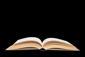open book isolated on black background with clipping path and  copy space for your text