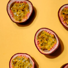 Creative layout made of passion fruit. Flat lay. Food concept. Colorful fruit pattern.