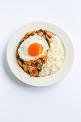 Rice topped with stir-fried chicken and holy basil, fried egg