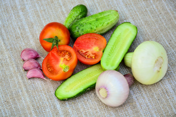 Fresh vegetables. Tomatoes, cucumbers, garlic, onions.	