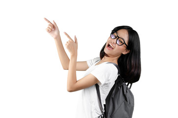 20s an Asian young pretty woman exited and carrying a backpack with white background