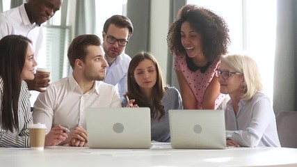 Mentor training business team interns workers gather discuss online project