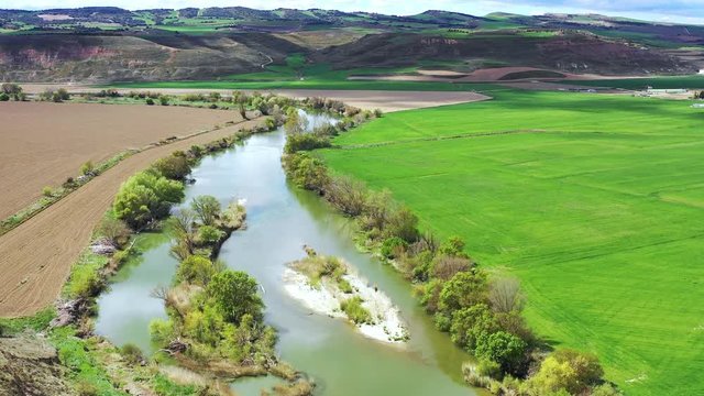 River and land aerial view.  Navarre, Spain, Europe. Drone view. 4K