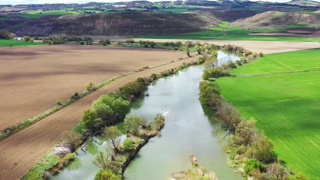 River and land aerial view.  Navarre, Spain, Europe. Drone view. 4K