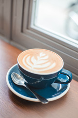 Basic latte arts on wooden table