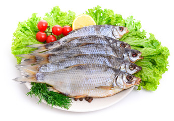 Dried bream on a plate