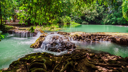 Landscape Waterfall Tropical forest. beautiful deep forest waterfall in green forest.