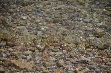 beach stones under water