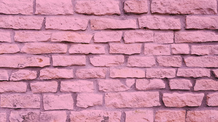 Light pink brick old stone wall texture background.