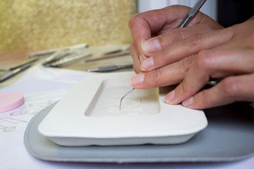 making a plaster mold for pouring liquid clay and creating a tablet with Egyptian hieroglyphs...
