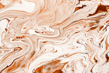 Caramel, cream dynamic and fluid raster texture. Abstract acrylic paints mixture color background.