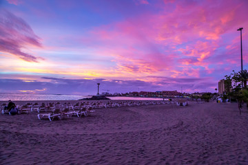 Amazing Purple Sunset over the Beach and the Ocean, Tenerife Island