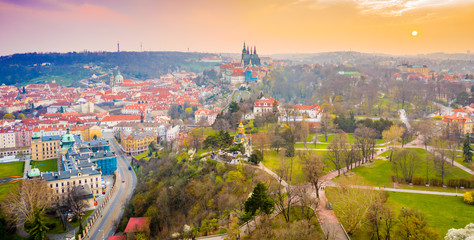 Aerial Panoramic View over The Prague City at Sunset Time, River, Bridges, Castle and Old Town, Czech Republic