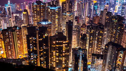 High view of Hong Kong skyline cityscape night light over Victoria harbour at Victoria Peak