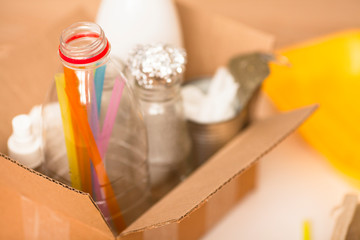 Sorting of garbage. Plastic and glass bottles, cans, paper. Waste management, sorting, recycling. 